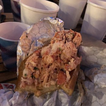 Frying Pan NYC - Half eaten lobster roll - Bars Near Me - New York, New York Frying Pan NYC - Half eaten lobster roll - Bars Near Me - New York, New York