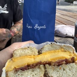 Bacon egg and cheese sandwich on an everything bagel Bacon egg and cheese sandwich on an everything bagel