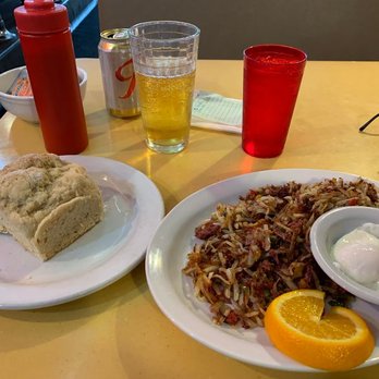 Twede's Cafe - Corned beef hash with poached eggs and a homemade biscuit. - American Near Me - North Bend, Washington Twede's Cafe - Corned beef hash with poached eggs and a homemade biscuit. - American Near Me - North Bend, Washington