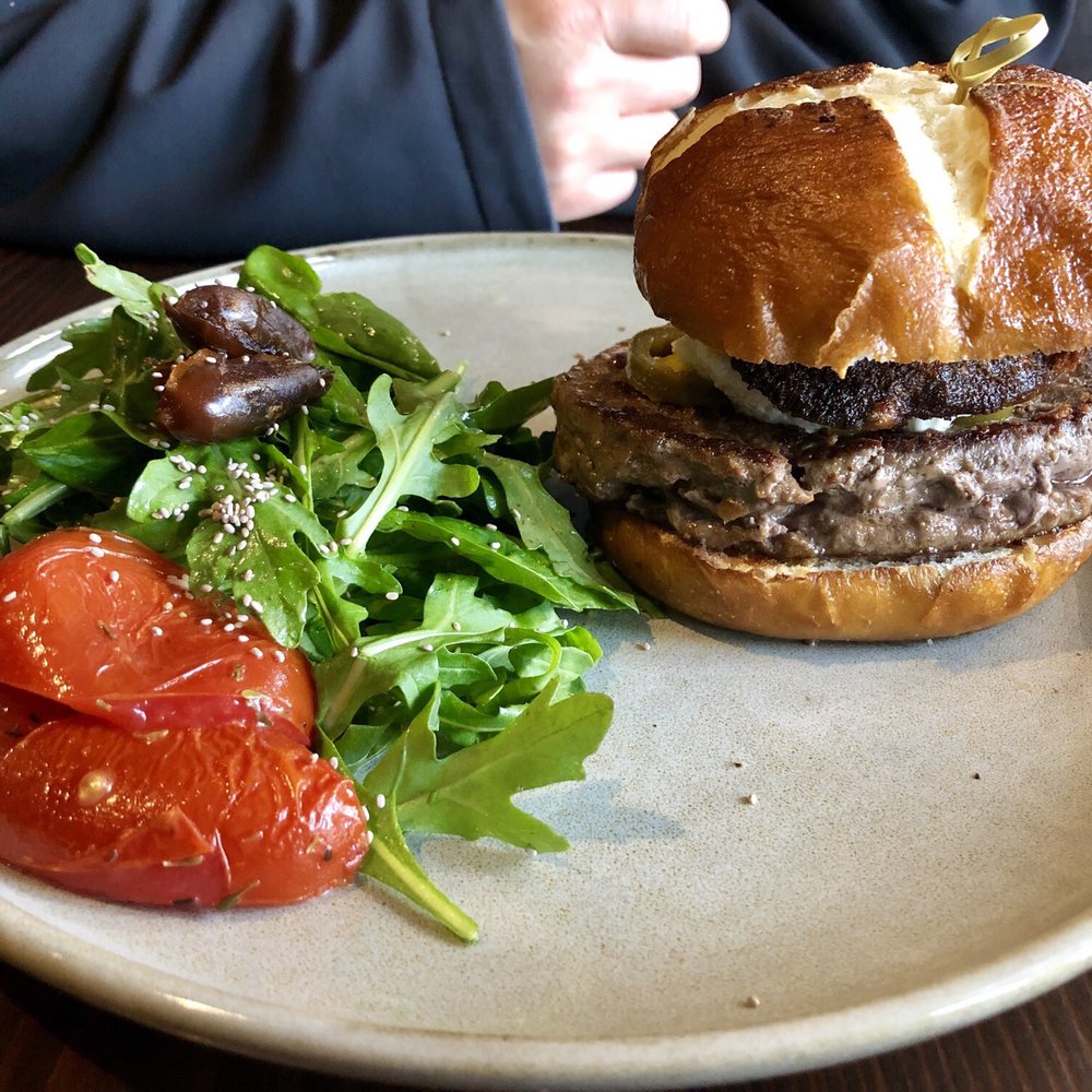 Graze - Tex Mex burger with side of house salad - Bars Near Me - Canmore, Alberta