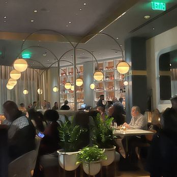 Hamilton's - a busy restaurant with people sitting at tables - New American Near Me - Detroit, Michigan Hamilton's - a busy restaurant with people sitting at tables - New American Near Me - Detroit, Michigan