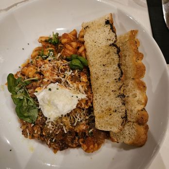 Tuscan Brick Oven Bistro - Bolognese with the add-on focaccia - Italian Near Me - Freeport, Maine Tuscan Brick Oven Bistro - Bolognese with the add-on focaccia - Italian Near Me - Freeport, Maine