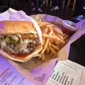 Christian's Tailgate - Mushrooms Swiss Mushroom Burger with lettuce tomato and pickle - Sports Bars Near Me - Houston, Texas
