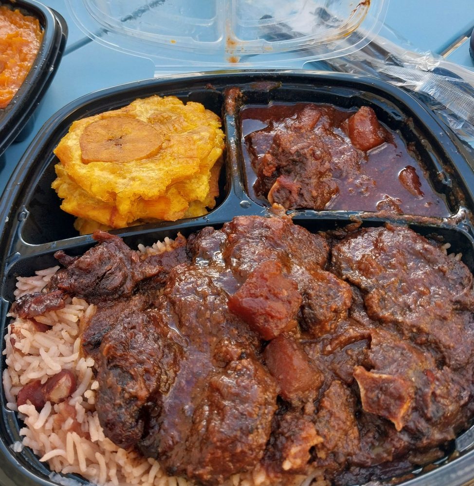 Strait Jamaican Cuisine Logo
