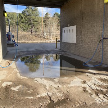 Mountain Suds - Even bigger puddle. And lots of mud. My shoes were nasty when I finished and I had just vacuumed. - Car Wash Near Me - Conifer, Colorado Mountain Suds - Even bigger puddle. And lots of mud. My shoes were nasty when I finished and I had just vacuumed. - Car Wash Near Me - Conifer, Colorado