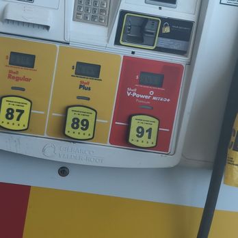 Shell - gas pumps at a gas station - Fuel pump at a Shell station offering Regular, Plus, and V-Power Nitro+ fuels with digital price displays and pressure indicators. - Gas Stations Near Me - Buckeye, Arizona