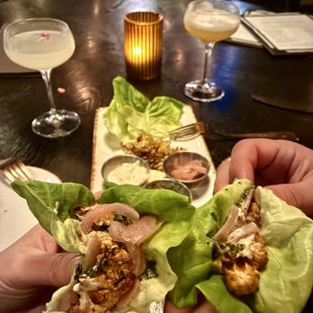 The Conspiracy - Cauliflower lettuce wraps - flavorful & fun! - Cocktail Bars Near Me - Charlotte, North Carolina The Conspiracy - Cauliflower lettuce wraps - flavorful & fun! - Cocktail Bars Near Me - Charlotte, North Carolina