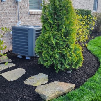 VMP Landscaping - an air conditioner outside a home - Snow Removal Near Me
