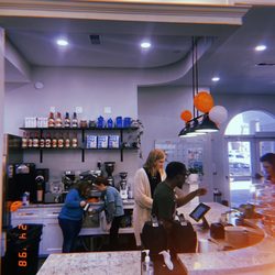 Coffee shop counter and staff