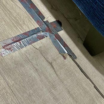 BeachBox Vacation Rentals - Tape holding floor together - Vacation Rentals Near Me - Galveston, Texas