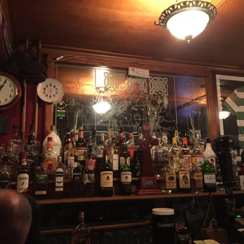 Tir Na Nog - a bar filled with alcohol bottles - Pubs Near Me - Trenton, New Jersey Tir Na Nog - a bar filled with alcohol bottles - Pubs Near Me - Trenton, New Jersey