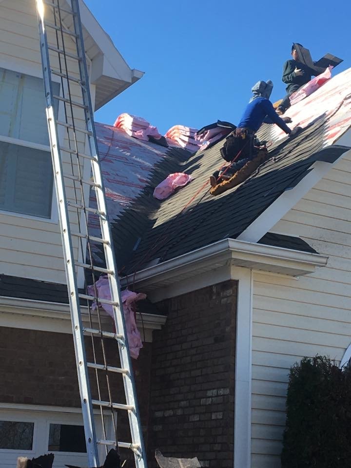 Slide of Rainblocker Roofing & Construction