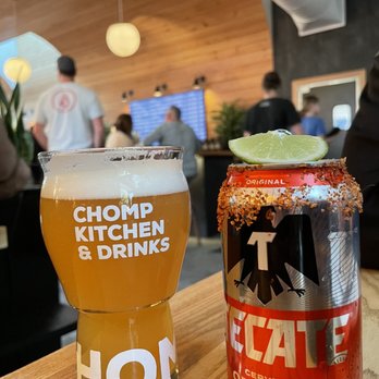 Chomp Kitchen & Drinks - Inside table area - a draft bissell beer and a Mexican ashtray. - American Near Me - Warren, Rhode Island Chomp Kitchen & Drinks - Inside table area - a draft bissell beer and a Mexican ashtray. - American Near Me - Warren, Rhode Island