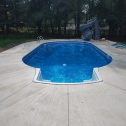Buff City Pools - Full renovation with new steps, slide, and fencing.