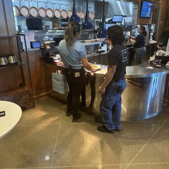 Black Walnut Café - Kitchen exit where the food comes before being taken to the customer by waiters - Cafes Near Me - Katy, Texas