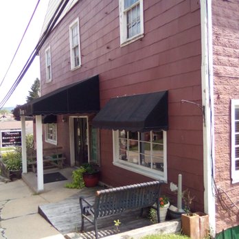 Monroe's Deli Style Eatery - a bench outside - Delis Near Me - Kingwood, West Virginia Monroe's Deli Style Eatery - a bench outside - Delis Near Me - Kingwood, West Virginia