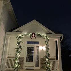 Grapids Irrigation - Holiday Lighting - Front Door at Night