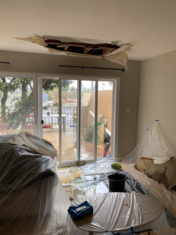 Slide of Rooster Roofing