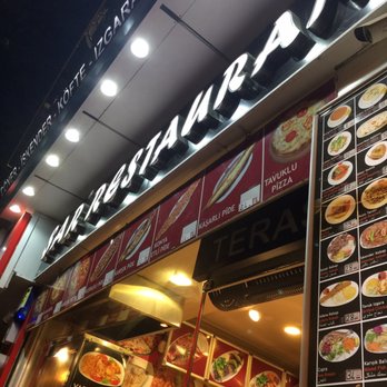 Şar Restaurant - Store front menu and last slice of pizza - Turkish Near Me - Istanbul, 34 Şar Restaurant - Store front menu and last slice of pizza - Turkish Near Me - Istanbul, 34