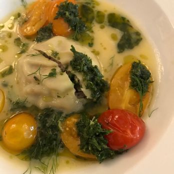 Botanica - Duck confit ravioli in a Parmesan broth - French Near Me - Portsmouth, New Hampshire