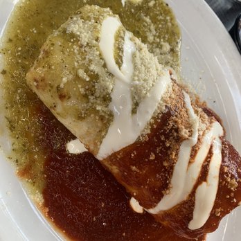Madero 1899 - Traditional Wet Burrito. Tastes good, but the red sauce is quite bitter. - Mexican Near Me - Fullerton, California Madero 1899 - Traditional Wet Burrito. Tastes good, but the red sauce is quite bitter. - Mexican Near Me - Fullerton, California