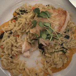 This is a picture of the halibut in orzo. It's not right from the kitchen. I had already started eating when I snapped this picture. This is a picture of the halibut in orzo. It's not right from the kitchen. I had already started eating when I snapped this picture.