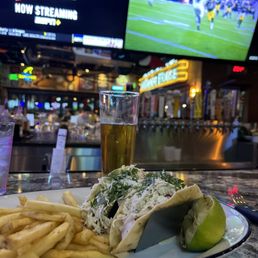 Grilled fish tacos with fries Grilled fish tacos with fries