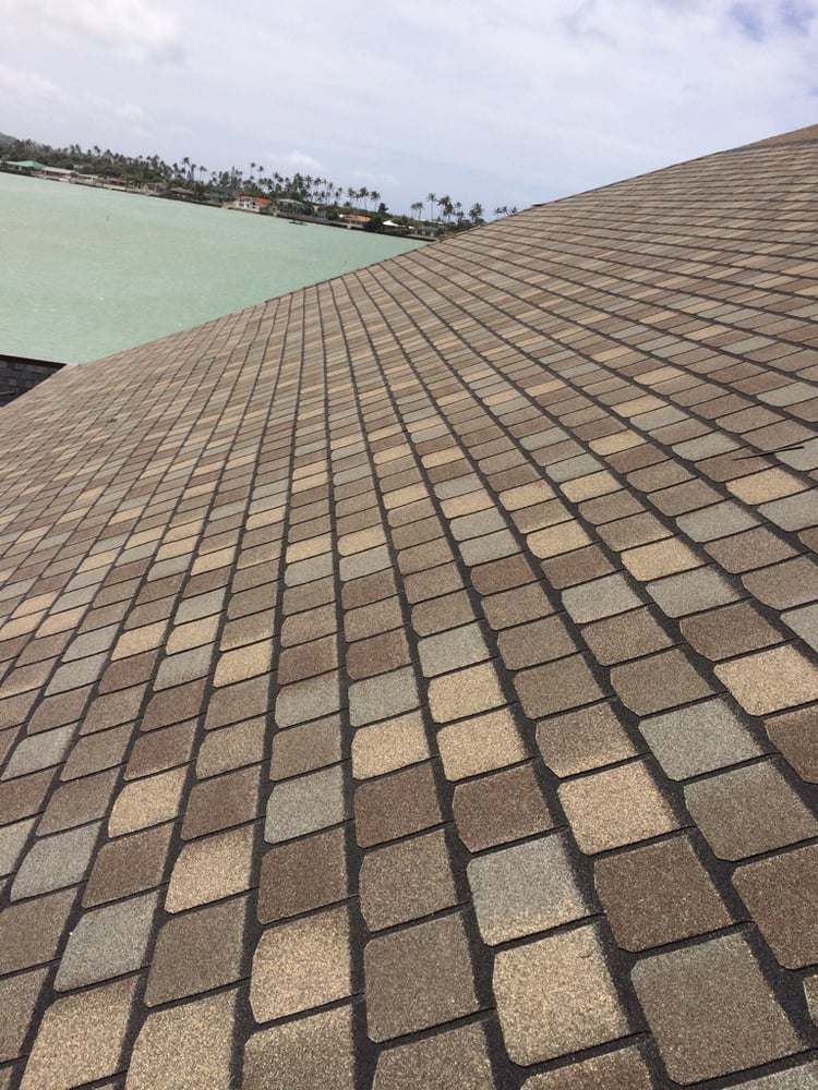 Slide of Surface Shield Roofing Company