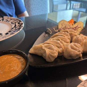 Zen Curry and Grill - VEGETABLE MOMOS...didn't even miss the meat at all! That sauce to the side was to die for..I even dipped my garlic cheese naan in it! - Indian Near Me - Temecula, California Zen Curry and Grill - VEGETABLE MOMOS...didn't even miss the meat at all! That sauce to the side was to die for..I even dipped my garlic cheese naan in it! - Indian Near Me - Temecula, California