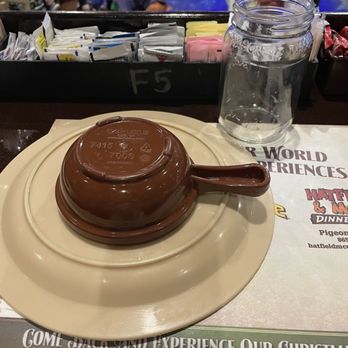 Dolly Parton's Stampede - We were seated along a bench. Plenty of room. At each place is a plate, soup bowl, fork, napkins, cup and straw. - Performing Arts Near Me - Branson, Missouri Dolly Parton's Stampede - We were seated along a bench. Plenty of room. At each place is a plate, soup bowl, fork, napkins, cup and straw. - Performing Arts Near Me - Branson, Missouri