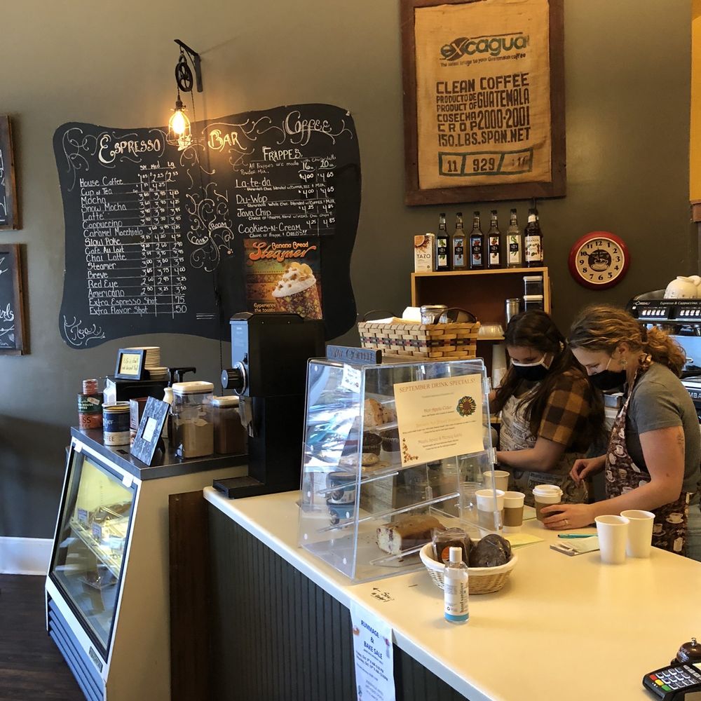 a woman working at a counter a woman working at a counter