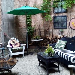 The Art Bar & Boutique - The patio out back is the perfect place to relax!