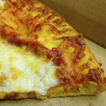 Golden Crust Pizzeria - Closeup of the golden crust. It's yellow from egg yolks apparently. - Pizza Near Me - Ottawa, Ontario