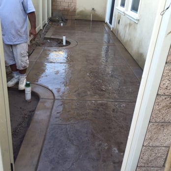 Sosaia Paea - Stamped concrete with borders around a fountain - Masonry/Concrete Near Me - Riverside, California Sosaia Paea - Stamped concrete with borders around a fountain - Masonry/Concrete Near Me - Riverside, California