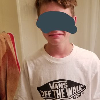 Great Clips - Poor guy, so embarrassed he has to where a hat, but sadly it doesn't cover the bottom "fade" - Hair Salons Near Me - Oceanside, California