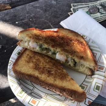 A Movable Feast - a sandwich on a paper plate - Caterers Near Me A Movable Feast - a sandwich on a paper plate - Caterers Near Me