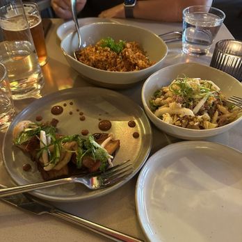 Peridot - Pork belly (front left), confit duck salad (front right), and crab fried rice (back) - Vietnamese Near Me - Ann Arbor, Michigan Peridot - Pork belly (front left), confit duck salad (front right), and crab fried rice (back) - Vietnamese Near Me - Ann Arbor, Michigan