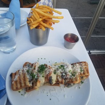 Watermark - Truffle grilled cheese sandwich with fries - Cocktail Bars Near Me - New York, New York Watermark - Truffle grilled cheese sandwich with fries - Cocktail Bars Near Me - New York, New York