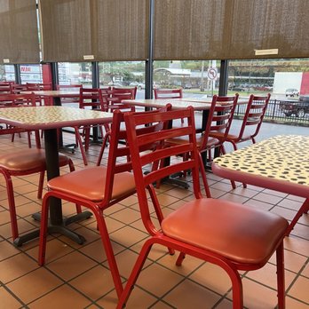 Firehouse Subs - red chairs and tables in a restaurant - Fast Food Near Me - Athens, Alabama Firehouse Subs - red chairs and tables in a restaurant - Fast Food Near Me - Athens, Alabama