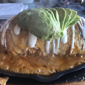 Super Antojitos - Chapman burrito topped with fresh sliced avocado. 2-1-23 - Mexican Near Me - Orange, California