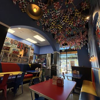 World Famous Hotboys - Nice dining eating area, has festive personality - Chicken Shop Near Me - Novato, California World Famous Hotboys - Nice dining eating area, has festive personality - Chicken Shop Near Me - Novato, California