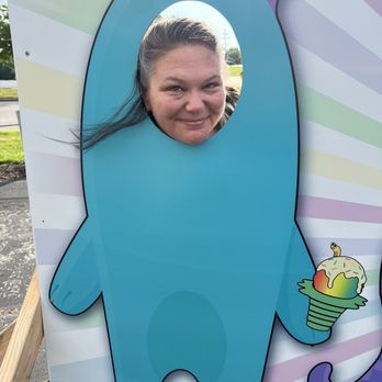 Snow Monster - a woman holding a sign with a picture of a snow monster - Shaved Ice Near Me - Pacific, Missouri Snow Monster - a woman holding a sign with a picture of a snow monster - Shaved Ice Near Me - Pacific, Missouri