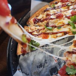 The Pizza Press - The cheese pull.