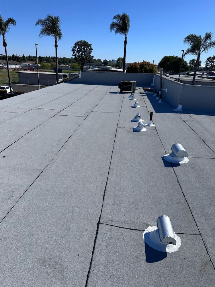 Slide of Tecun’s Roofing