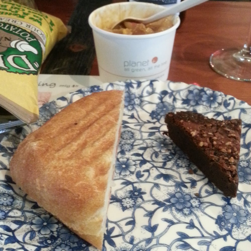 Half Proscuitto sandwich and half soup with a bonus brownie and a side of chips. Half Proscuitto sandwich and half soup with a bonus brownie and a side of chips.