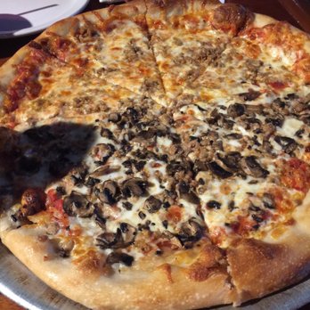 Thirsty Fellow - Large Italian pizza with half mushrooms - American Near Me - Columbia, South Carolina Thirsty Fellow - Large Italian pizza with half mushrooms - American Near Me - Columbia, South Carolina