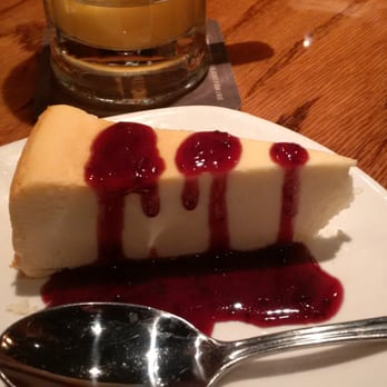 Outback Steakhouse - Cheesecake with raspberry sauce - Steakhouses Near Me - Schaumburg, Illinois Outback Steakhouse - Cheesecake with raspberry sauce - Steakhouses Near Me - Schaumburg, Illinois