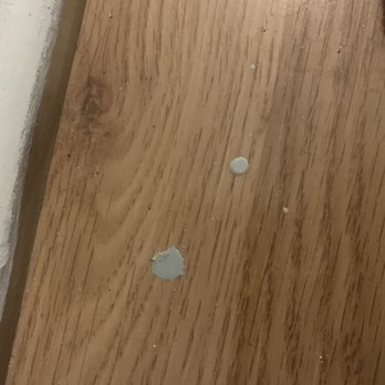 CertaPro Painters of Central IL - Drops of paint in flooring. - Painters Near Me - Bloomington, Illinois CertaPro Painters of Central IL - Drops of paint in flooring. - Painters Near Me - Bloomington, Illinois