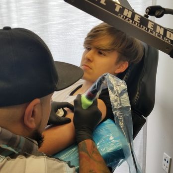 Till The End Tattoos - Tattoo Bam Bam starting on my son's first tattoo - Tattoo Near Me - Miami, Florida Till The End Tattoos - Tattoo Bam Bam starting on my son's first tattoo - Tattoo Near Me - Miami, Florida