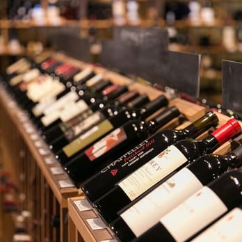 Westside Wine & Spirits - a row of wine bottles - Beer, Wine & Spirits Near Me - Wilson, Wyoming